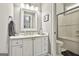 Clean bathroom with a white vanity and a tiled shower stall at 602 Embassy Ct, Peachtree City, GA 30269
