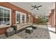 Covered patio with outdoor seating area at 602 Embassy Ct, Peachtree City, GA 30269