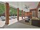 Covered patio with lounge chairs and an outdoor seating area at 602 Embassy Ct, Peachtree City, GA 30269