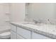 Bright bathroom showcasing granite countertops, a modern faucet, a white sink, and a shower at 285 Limestone Circle, Conyers, GA 30013