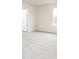 Bright bedroom with soft carpet and large window for natural light at 285 Limestone Circle, Conyers, GA 30013