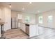 Bright kitchen features stainless steel appliances, granite countertops, and a spacious island at 285 Limestone Circle, Conyers, GA 30013