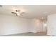 Spacious living room with laminate flooring, ceiling fan and neutral walls at 285 Limestone Circle, Conyers, GA 30013