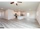 Expansive living space with an open layout seamlessly connecting the kitchen and living room at 285 Limestone Circle, Conyers, GA 30013