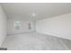 Spacious bedroom with gray carpet and two large windows offering plenty of natural light at 315 Limestone Circle, Conyers, GA 30013