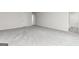 A bedroom featuring neutral walls, plush gray carpeting, and ample space at 315 Limestone Circle, Conyers, GA 30013
