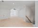 Bonus room features white walls, trim, ceiling fan, and natural light at 4731 H D Atha Rd, Covington, GA 30014