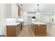 Spacious open-concept kitchen with an island, ample counter space, and pendant lighting at 4731 H D Atha Rd, Covington, GA 30014