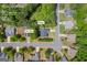 Aerial view of 4985 Rolling Rock Drive highlighting the home and a hot tub in Sugar Hill, GA at 4985 Rolling Rock Dr., Sugar Hill, GA 30518