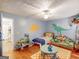 This colorful room has a fun theme, play area, and adjoining bath at 75 Grady Smith St, Grantville, GA 30220