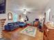 Cozy living room with a fireplace, comfortable seating, and ample natural light at 75 Grady Smith St, Grantville, GA 30220