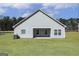 Spacious backyard featuring a covered patio perfect for outdoor entertaining and relaxation at 481 Cantrell Drive, Dallas, GA 30157