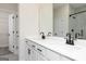Bathroom with double sink vanity, quartz countertop, and framed mirror at 539 Cantrell Drive, Dallas, GA 30157