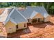 A view of the rear of the home featuring a covered patio and large backyard at 4751 H D Atha Rd, Covington, GA 30014