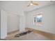 Bright bedroom with a ceiling fan, closet and large window offering abundant natural light and a view at 4751 H D Atha Rd, Covington, GA 30014