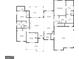 Detailed floorplan featuring an open concept living room, dining area, and kitchen, plus a primary suite at 4751 H D Atha Rd, Covington, GA 30014