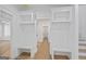 Bright mudroom features built-in storage with a bench and cubbies, blending functionality with clean, modern design at 4751 H D Atha Rd, Covington, GA 30014