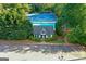 Aerial view of pool, cabana and tennis court at 205 N Strathmore Dr, Sharpsburg, GA 30277