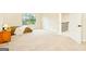 Spacious bedroom with large window and neutral carpet, ready for your personal touch at 2589 Lake Erma Dr, Hampton, GA 30228