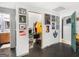 The basement features an open closet with clothes and shelves, along with an access to the bathroom at 140 Joshua St, Palmetto, GA 30268