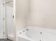 This bathroom features a tub and shower combination at 140 Joshua St, Palmetto, GA 30268