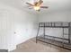 A basic bedroom featuring neutral-colored walls, with a door and bunk bed at 140 Joshua St, Palmetto, GA 30268