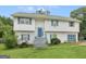 Charming two-story home with a well-maintained lawn and a blue front door, complete with green trim at 140 Joshua St, Palmetto, GA 30268