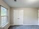 A bedroom with a window and closet at 530 Austin Dr, Mcdonough, GA 30252