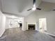 Inviting living room with a cozy fireplace, neutral paint, new floors, and an open layout at 530 Austin Dr, Mcdonough, GA 30252