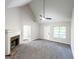 Spacious living room with a fireplace, and neutral paint scheme, offering a welcoming atmosphere at 530 Austin Dr, Mcdonough, GA 30252
