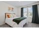 Cozy bedroom with a comfortable bed, soft pillows, and natural light from two windows at 109 Feeney Lane, Villa Rica, GA 30180
