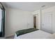 Bright bedroom showing ensuite bath and closet doors and comfortable bed at 109 Feeney Lane, Villa Rica, GA 30180