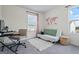 Well-lit office space with a desk, comfortable chair, futon and a decorative world map at 109 Feeney Lane, Villa Rica, GA 30180