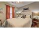 Cozy bedroom featuring beachy decor and comfortable furnishings at 254 Roberts Trl, Locust Grove, GA 30248