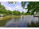 Expansive lake view surrounded by trees and residential docks at 254 Roberts Trl, Locust Grove, GA 30248