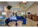 Comfortable living room showcasing vaulted ceilings, stylish furniture, and an open concept design at 254 Roberts Trl, Locust Grove, GA 30248