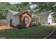 Image of a home showcasing the side and rear exterior, featuring a combination of vinyl siding and brick accents at 254 Roberts Trl, Locust Grove, GA 30248