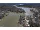 Beautiful lake and forest with several houses with docks and boathouses along the shoreline at 405 Miller Rd, Covington, GA 30014
