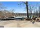Outdoor seating and lake view in backyard at 405 Miller Rd, Covington, GA 30014