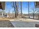 A patio with a view of the lake offers a serene outdoor experience for dining and relaxing at 405 Miller Rd, Covington, GA 30014