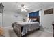 Spacious bedroom with a large bed, neutral colors, and natural lighting creates a peaceful retreat at 405 Miller Rd, Covington, GA 30014