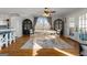 Charming dining room with natural light, hardwood floors, and cozy seating at 405 Miller Rd, Covington, GA 30014