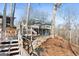 Exterior of lakeside home with multiple decks and wooded surroundings at 405 Miller Rd, Covington, GA 30014