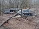 Lakeside home with multiple staircases down to the shore at 405 Miller Rd, Covington, GA 30014