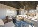 Outdoor patio area with furniture, a ceiling, and natural light at 405 Miller Rd, Covington, GA 30014