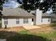 Backyard with patio and view of back of home at 3081 Regal Dr, Mcdonough, GA 30253