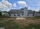 Backyard with a patio and a view of the house at 3081 Regal Dr, Mcdonough, GA 30253