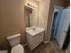 Bathroom showcasing the vanity with a white sink and a mirror at 3081 Regal Dr, Mcdonough, GA 30253