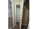 Hall closet with multiple shelves perfect for linen and storage needs at 3081 Regal Dr, Mcdonough, GA 30253