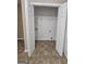 View of the laundry room with a washer and dryer hookup and white wire shelving at 3081 Regal Dr, Mcdonough, GA 30253